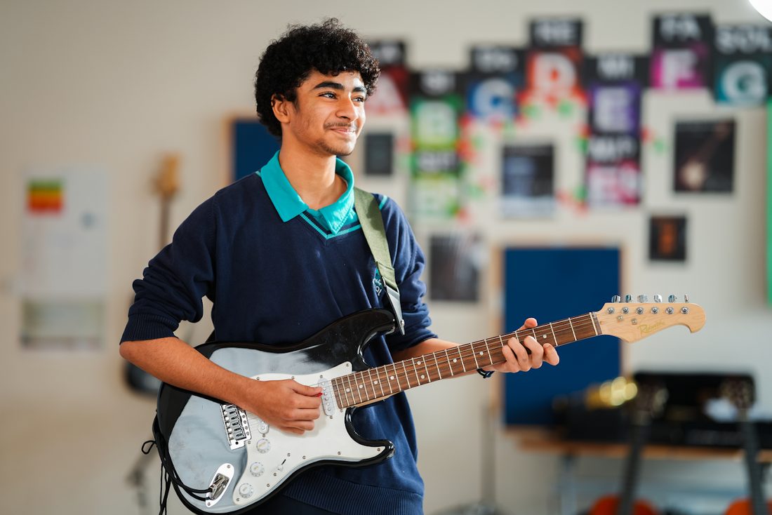 A student in the music room at Ajyal International School