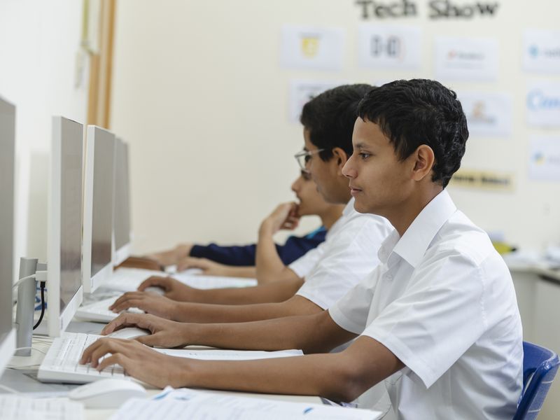 Students working in the IT suite